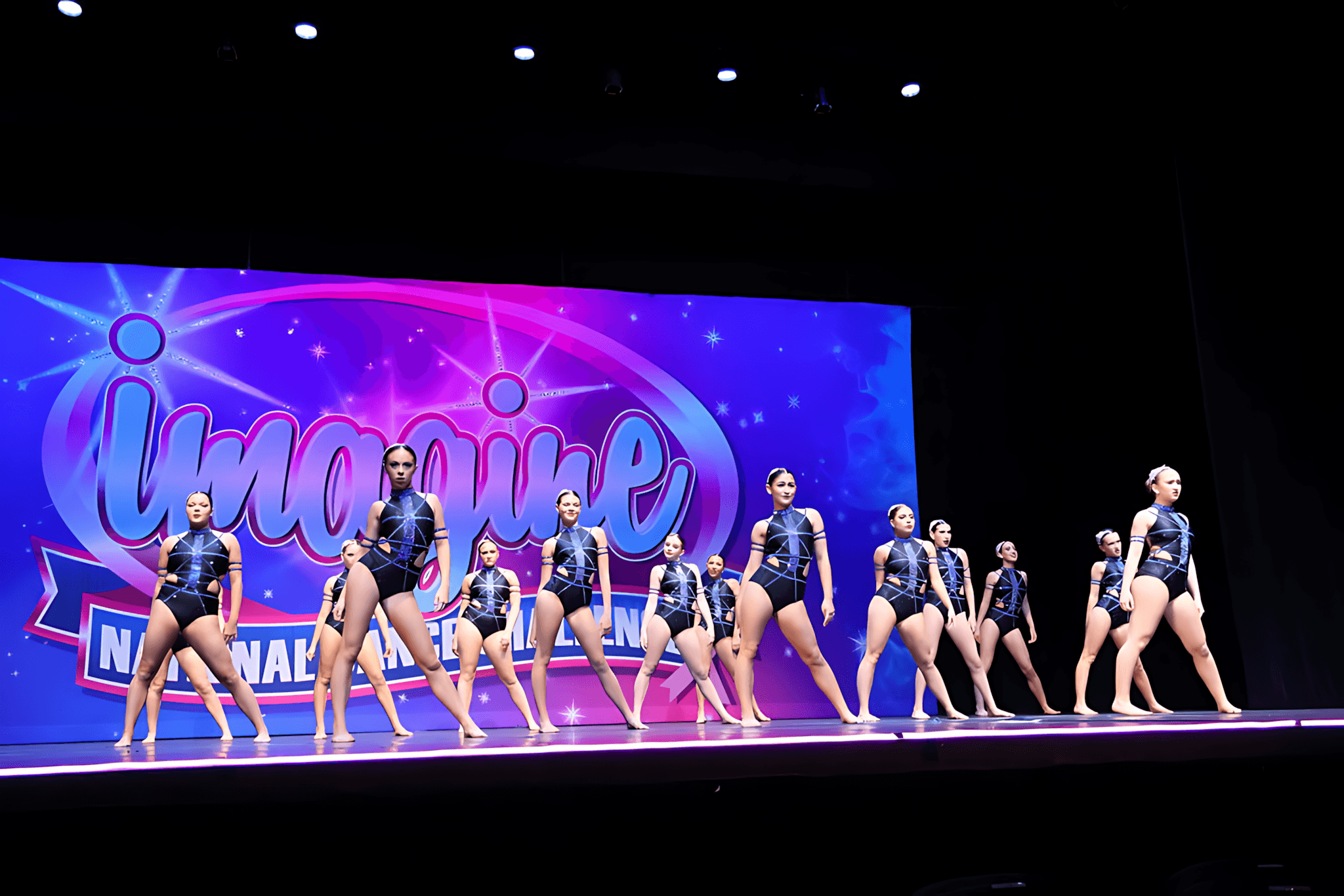 DXNY dancers performing on stage